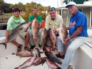 Sea Hag regulars Cole and Derek with Randy Harris, JJ and Pops with this nice mixed bag of red grouper and amberjacks.