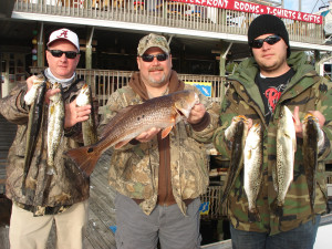 Ken Ford, with Mark and Troy Lewis from Warner-Robbins, Georgia with a great inshore mixed bag. 