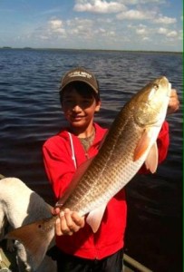 Sea Hag regular Chase Norwood with a fine redfish taken in his jon boat