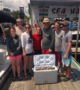 The Chuck Rice family from Valdosta with their boat limit of scallops. 