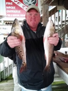 Tommy Ballard from Oxford, Ga. with a fine pair of keeper redfish