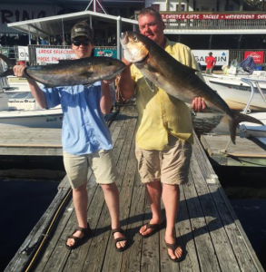 Chris and Tommy Ballard with two fine amberjack. 