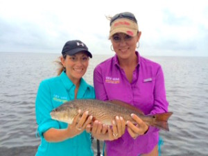 Tonya Stalvey and Tiffany Murphy with a nice keeper redfish.