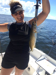 Amber Arnold with a keeper trout.