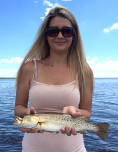Brittany Carmichael with a fine keeper trout.