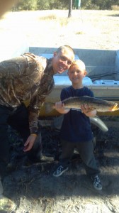 Jordan Marlo, fishing with dad Chris, caught his first trout fishing near the mouth of the river early in the month.