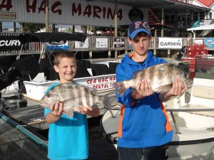  Ethan and Dalton Wells from St. Augustine found the sheepshead bite to their liking.