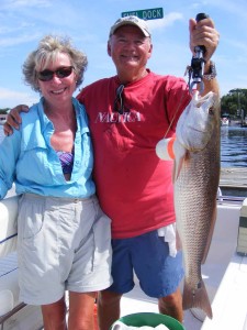 Carol and Charlie Waters with a fine upper-slot redfish. 