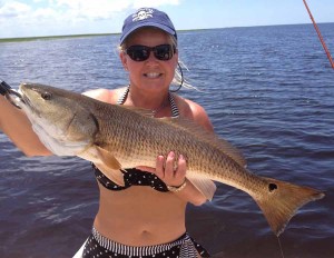 Michelle Hudson from West Palm Beach, found this great tournament-sized 27 inch redfish near Dallus Creek. 