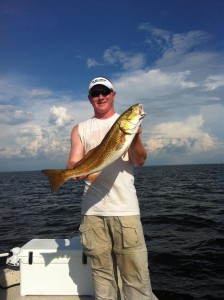 Zac Knight with an excellent redfish caught north of the river.
