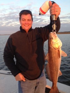 Lindsey Trowell from Jacksonville with a big redfish caught while fishing with Dr. Doug Barrett. 