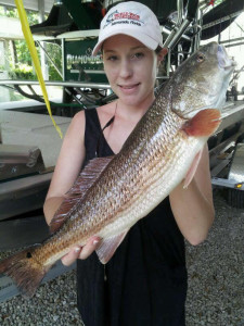 Leanne Harris was fishing with her dad and landed this fine redfish on a live shrimp. 