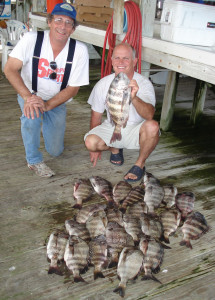 Ray Malloy and Eston Crowder with several sheepshead limits.