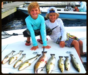 Trace and Logan with their excellent catch using live shrimp.