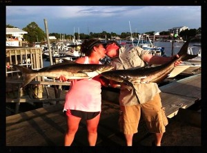 Clearly on an especially romantic fishing trip, Avi and Dorina Adler found this nice pair of cobia. 