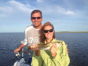 Sara and Mark with one of many trout, caught on topwater plugs