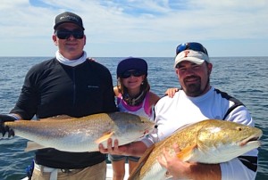 Grouper fishing is a great way to find oversize bull redfish. Jason and Ryan Norton and Cameron all hooked up at the same time. 