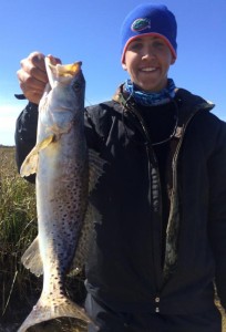 Luke Matthews caught this fine trout in one of the local creeks using a Paul Brown lure. 