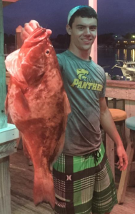Nick Oelrich from Newberry with a fine red grouper dinner. 