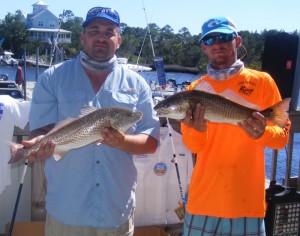 Joey Forrester and Blake O’Connor with two redfish caught in the Optimist Tournament.