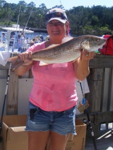 Monica Kolicia caught the biggest redfish in the Optimist Tournament. 