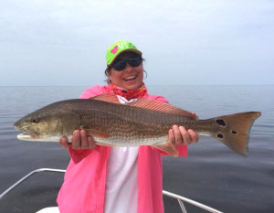 Shawna Phillips is happy with her upper-slot redfish. 