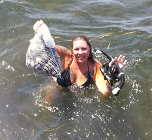 Edyie Hollander with an excellent bag of scallops from the Keaton area. 