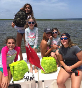 The Carrington and Elliot girls with multiple limits in their Sea Hag rental boat. 