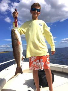 Cannon Carr with another upperslot redfish taken near shore. 