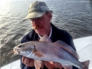 I took old friend Capt. Joe Jacobs from Lake Worth out for some redfishing.