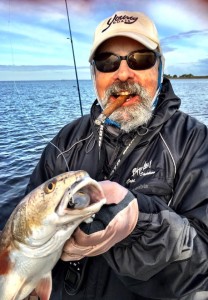 Fishing with Doug Barrett, I had to celebrate a nice redfish with a high quality cigar.   