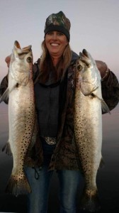Claudia Sauls with a pair of huge winter gator trout. 
