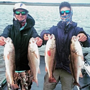 Garrett Smith and Chris Oliver with their redfish limits. 