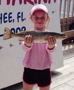 Chloe Truluck and a winning trout in the Fishing for Kids tournament
