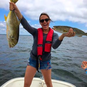 Laura Baird scored this large trout and larger jack crevalle, and was excited about it!