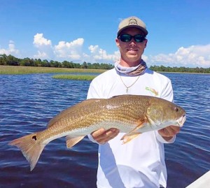  Garrett McKinney with a fine redfish. 