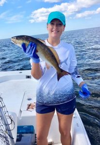 Jamie Blumer from High Springs went fishing with her dad and brought home a redfish for dinner. 