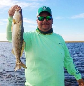 Jesus Lopez with a nice trout from the flats. 